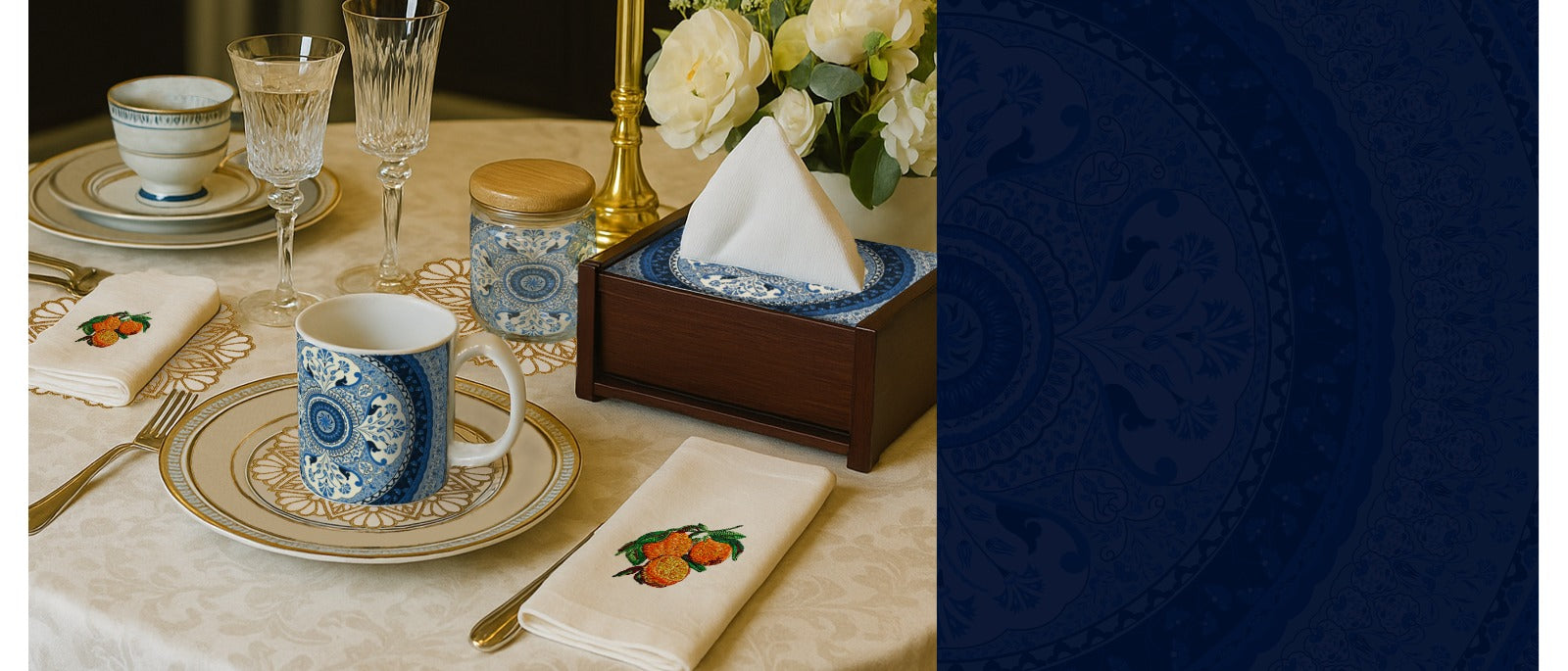 Dining table setting with a blue and white mug, plates, and napkins with fruit design.